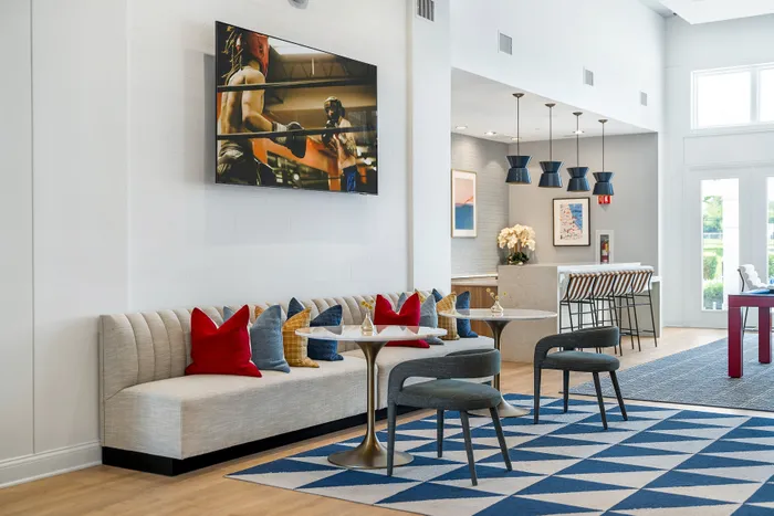clubhouse with tv screen on wall