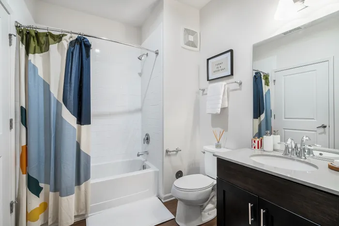 bathroom and shower with tub