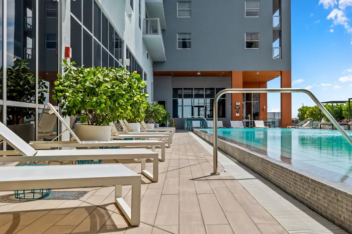 pool and lounge chairs at Motion at Dadeland