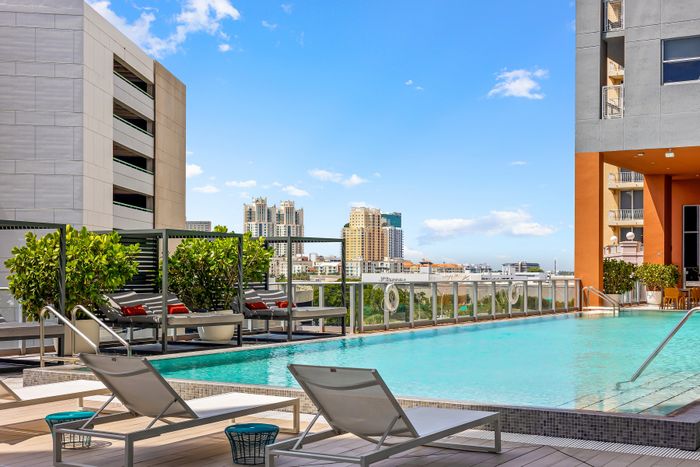 pool deck for swimming luxurious amenities at Motion at Dadeland