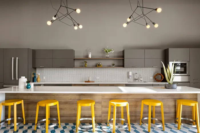 lounge seating and kitchen at Motion at Dadeland