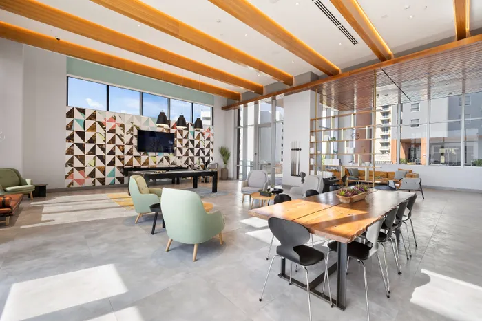 lounge area with table at Motion at Dadeland