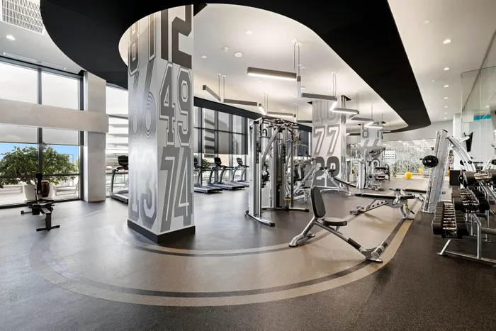 high-end fitness center at luxurious apartment complex in Dadeland