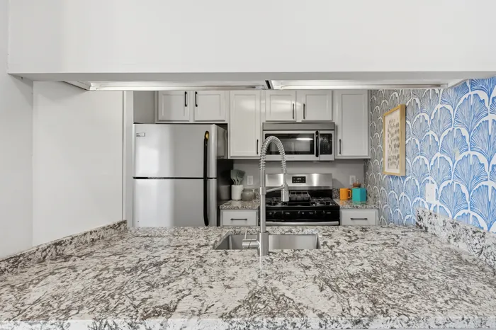 Kitchen showing fancy countertop
