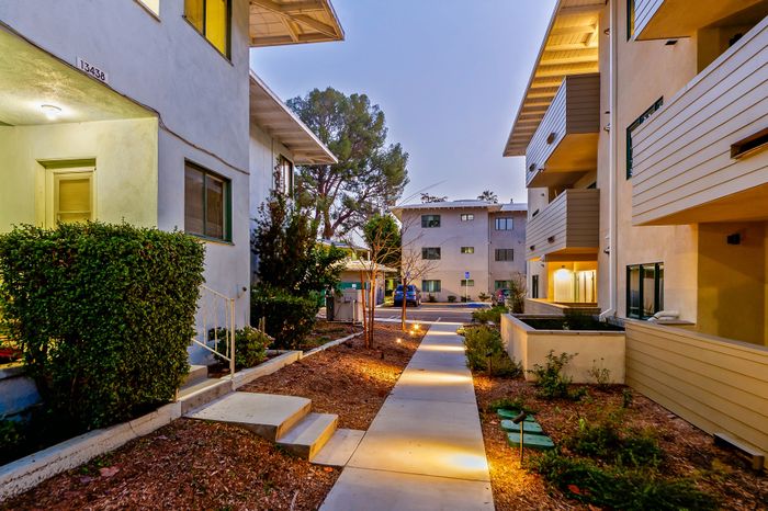 pathway and building with patios