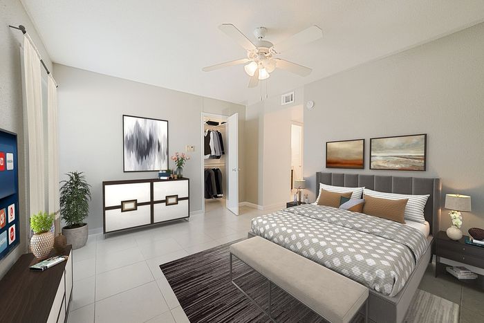 Inviting bedroom with modern decor, featuring a cozy bed, stylish dresser, and lush indoor plants for a relaxing ambiance.