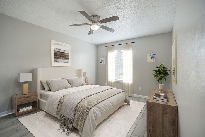 Elegant bedroom with modern decor, featuring a cozy double bed, stylish wooden nightstands, and soft natural lighting from a large window.