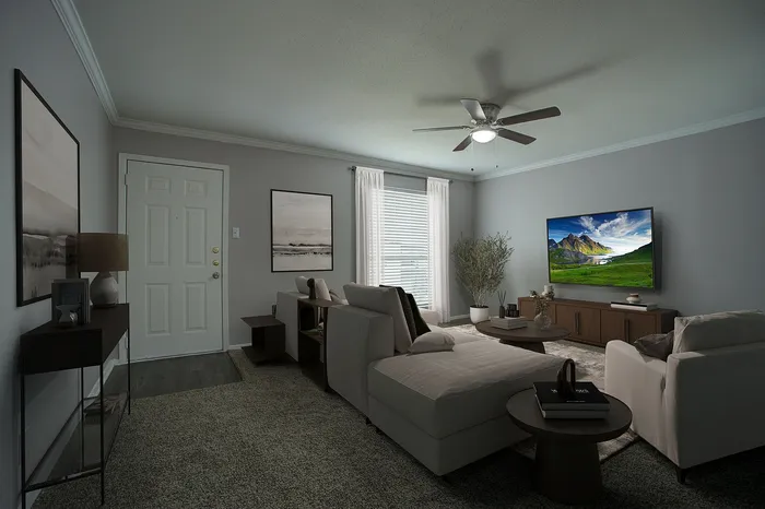 Elegant living room featuring a cozy sectional sofa, modern decor, large flat-screen TV, and natural light streaming through window.