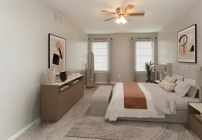 Elegant bedroom featuring stylish decor, plush bedding, and natural light streaming through large windows.