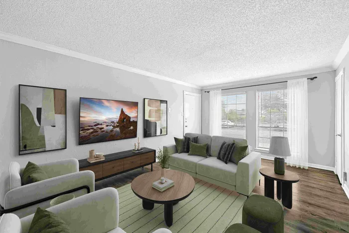 Chic living room with modern decor, featuring a plush green sofa, elegant wooden coffee table, and large windows offering natural light.