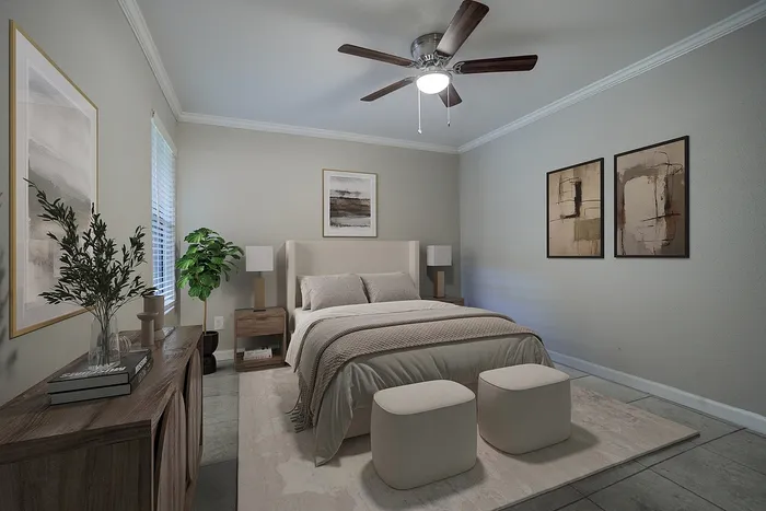 Inviting modern bedroom with cozy neutral tones, stylish artwork, and elegant lighting, perfect for relaxation.