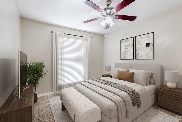Elegant bedroom with cozy decor, featuring a comfortable bed, modern wooden furniture, and chic abstract wall art. Natural light filters through stylish curtains, creating a serene ambiance.