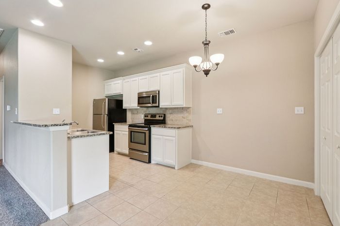B2 - DUPLEX - 2BD, 2BA - 1054SF - Dining Room/Kitchen