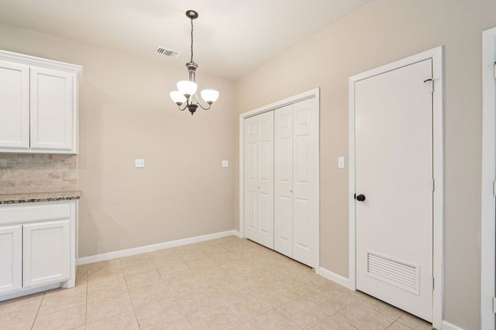 B2 - DUPLEX - 2BD, 2BA - 1054SF - Dining Room/Laundry