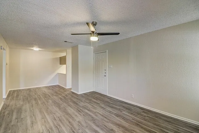 A1 living and dining area with plank-style flooring