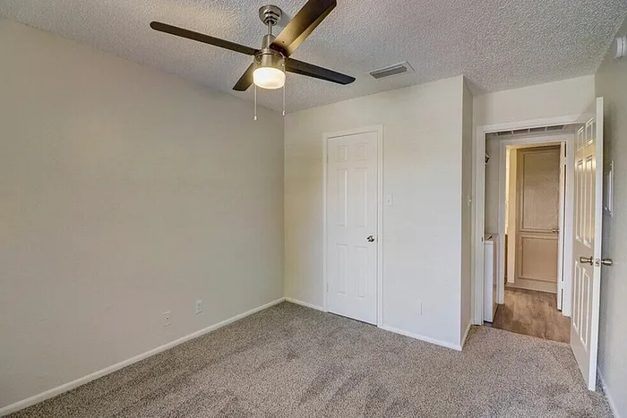 A1 bedroom viewed toward the doorway
