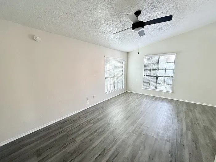 A2 bedroom with window and ceiling fan