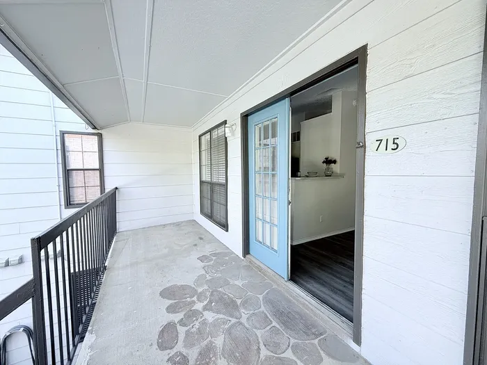 A2 apartment balcony overlooking the swimming pool