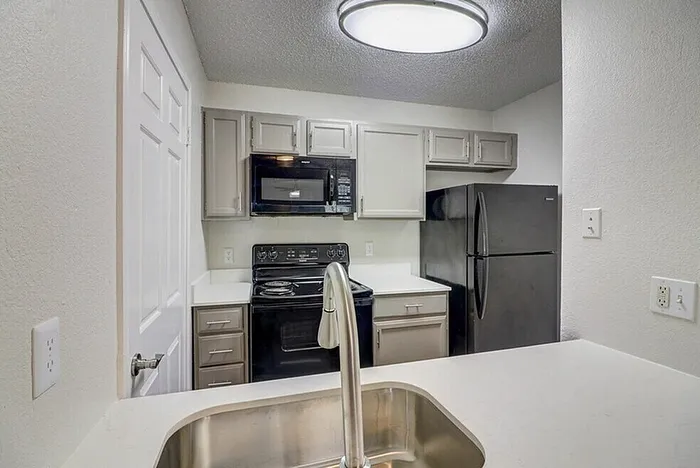 B1 apartment kitchen with appliance package