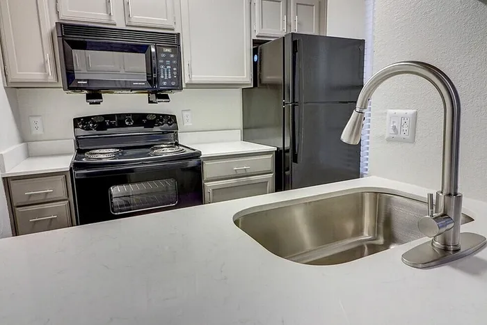 B1 kitchen with cabinets and countertops