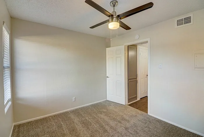 B1 guest bedroom viewed toward the doorway