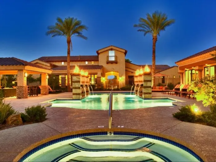 Liv Avenida  Apartments for rent in Chandler AZ - night time pool and spa glowing