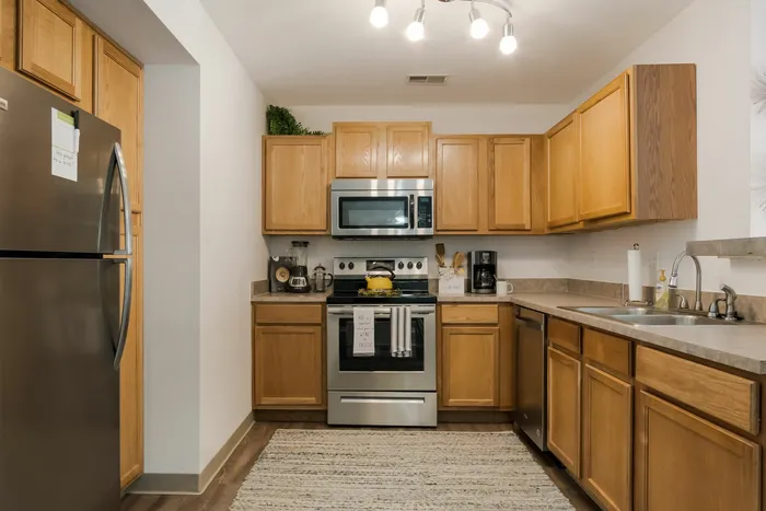Spacious kitchen at Liv Wildwood apartments in Ludington, Michigan.