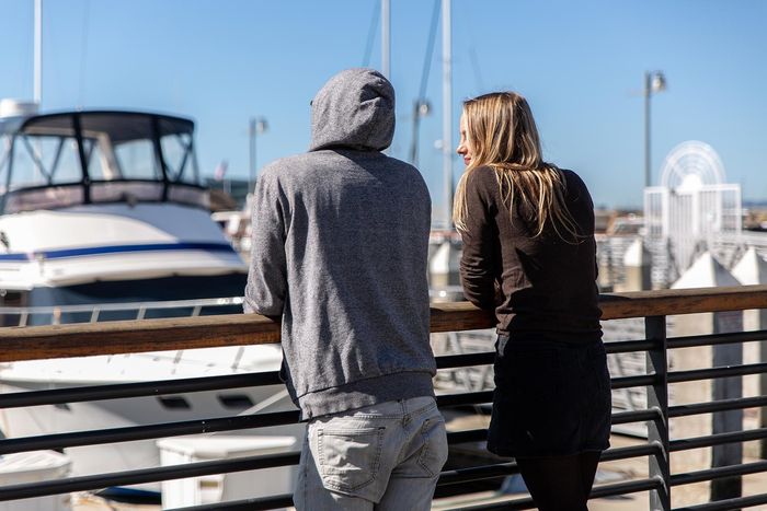 two people watching the boats