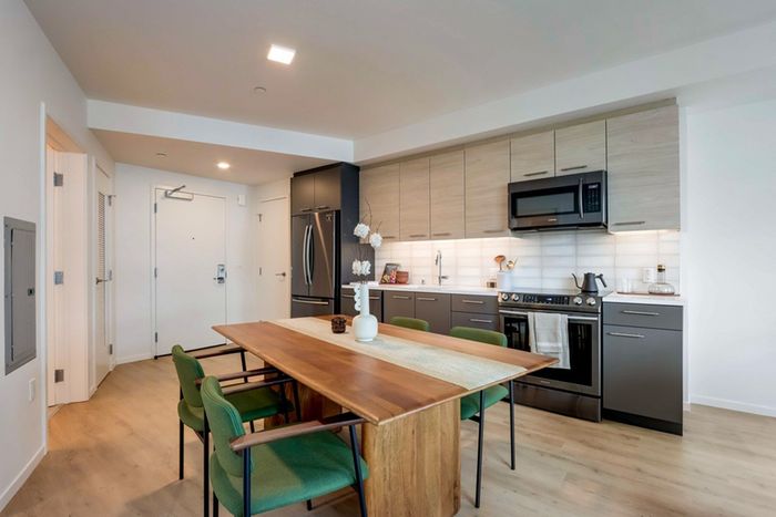 Two Bedroom Apartments in Jack London Square Oakland CA - Channel House - Interior Living Room with Wood-Style Flooring