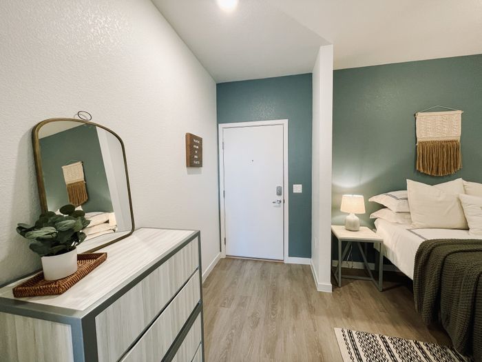 Colfax style unit hallway area with closet and dresser