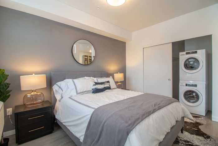 Bedroom with included washer and dryer