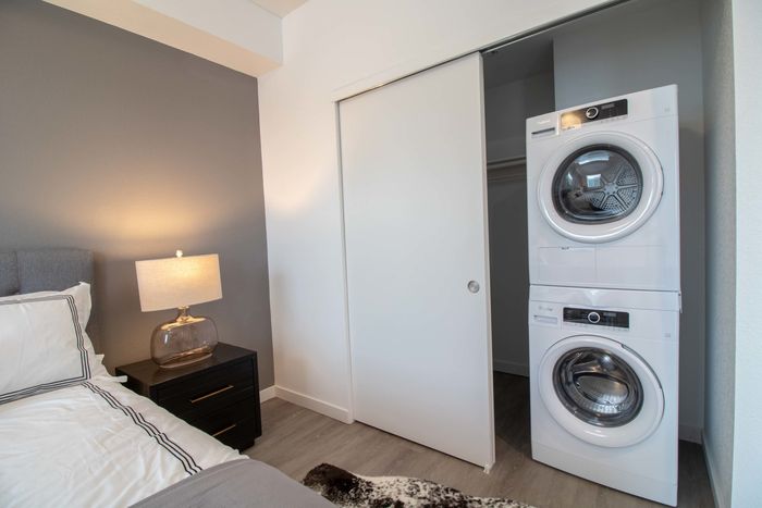 One washer and one dryer in the bedroom