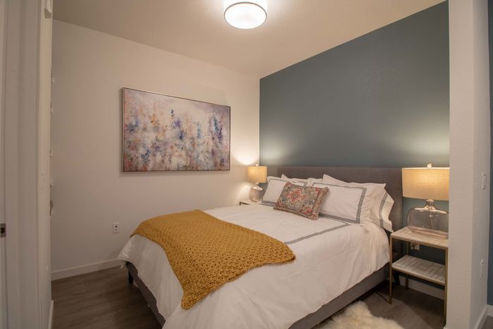 Cozy bedroom with two lamps