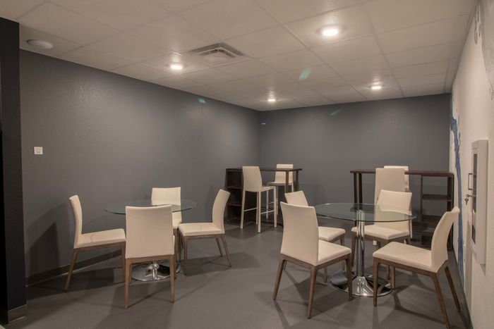 Seating space within dining entertainment lounge