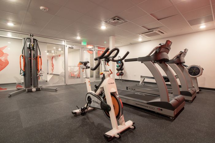 Fitness center with multiple workout machines