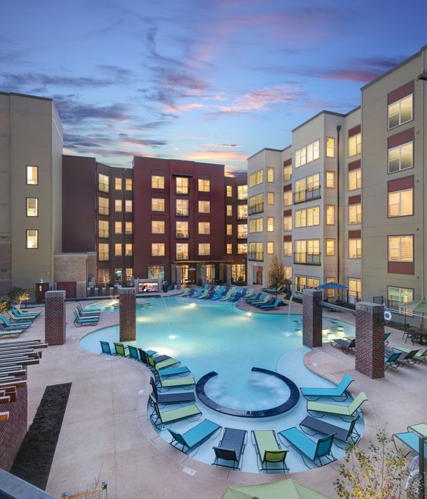 Lofts at City Center exterior beautiful pool at night