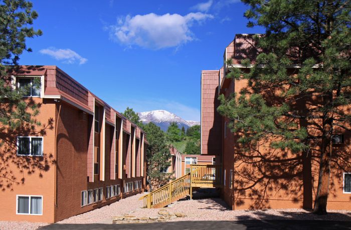 apartments with mountains in the background