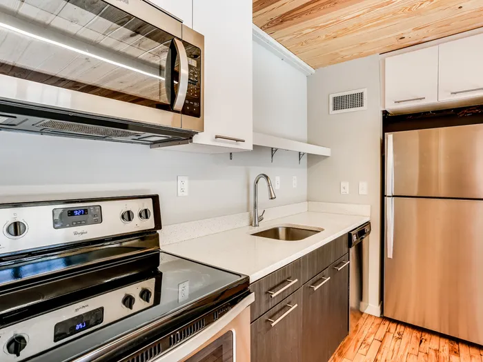 The Fox Building kitchen with stainless steel appliances.