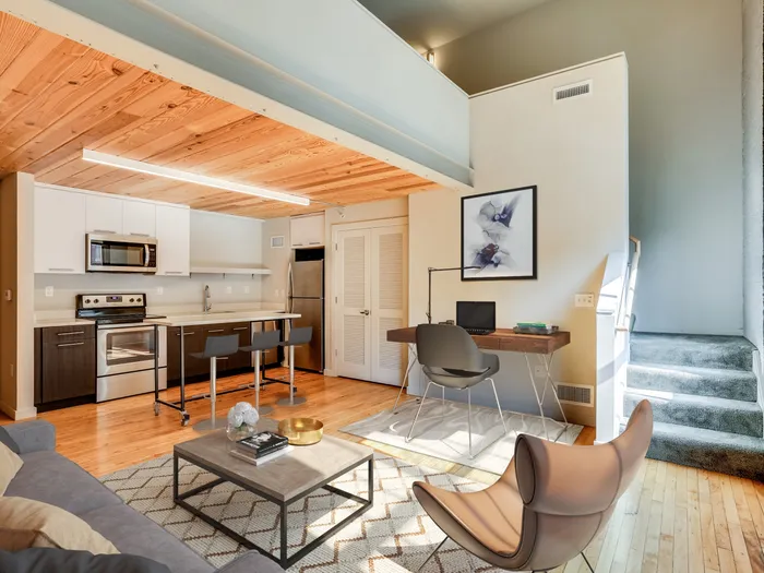 Furnished living room with open concept at The Fox Building.