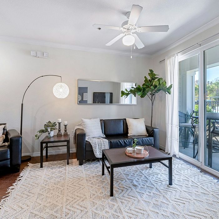 the hudson statesboro student housing model living room with furniture