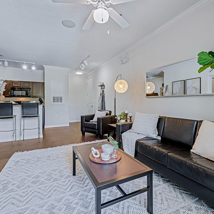 the hudson statesboro student housing model living room with furniture