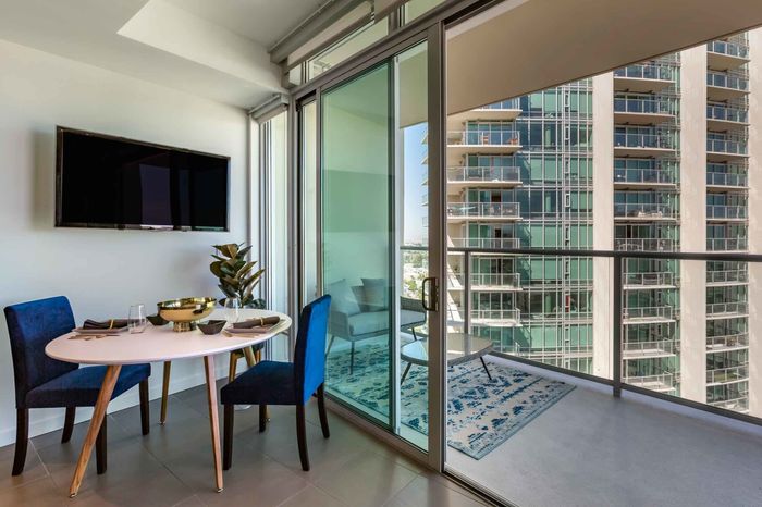 dining room table and chairs next to balcony west 6th tempe