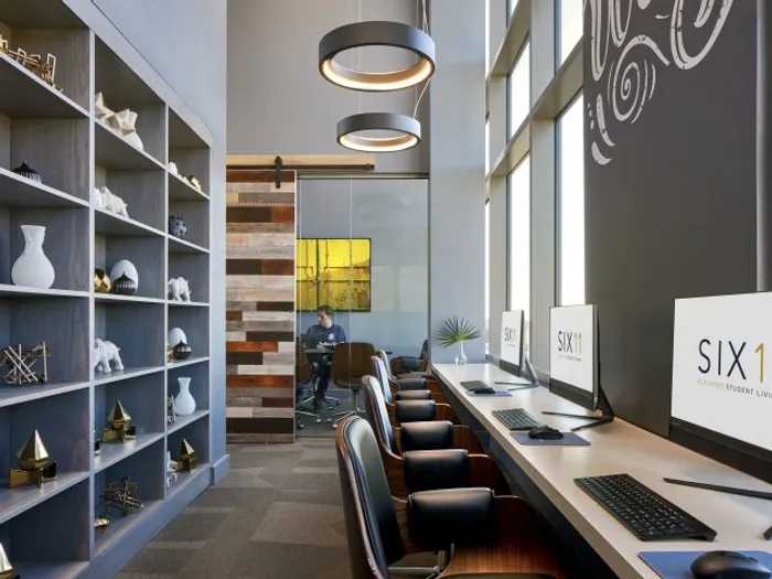 business center with computers and seating six11 ann arbor
