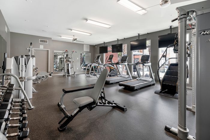 fitness center  with treadmills, stairmaster,and free weights. campus crossings on highland