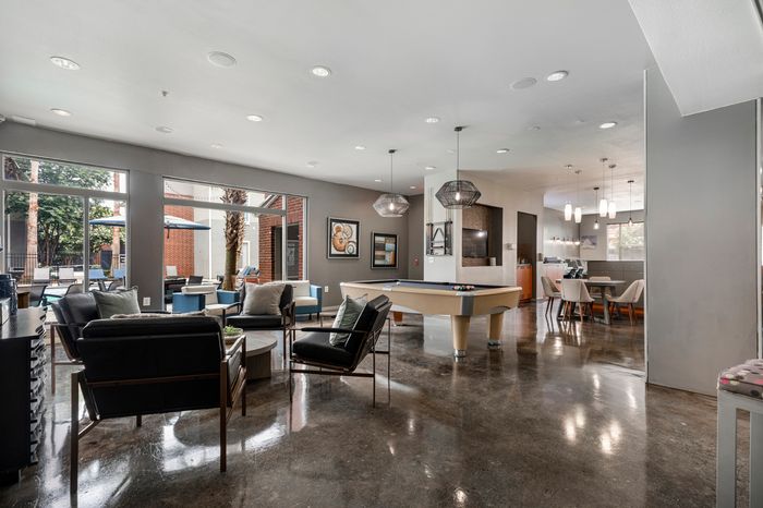 clubhouse with pool table and chairs campus crossings on highland baton rogue