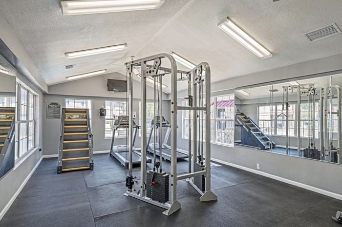 campus crossings alafaya fitness center with stairmaster, treadmills, and weight machine