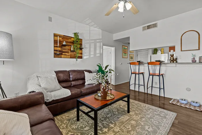 campus crossings at star pass model unit living area overlooking kitchen