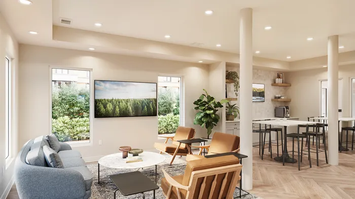 upgraded resident lounge with couches, chairs, and tables.