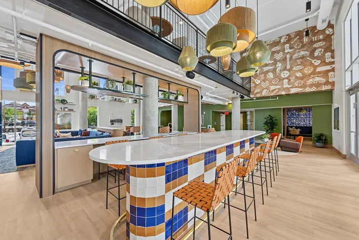 tenn student living knoxville community room with coutertop and stools