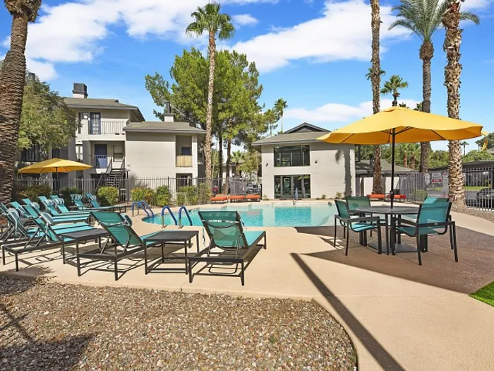 Resort-style pool with loungers at 225 North in Tucson, Arizona